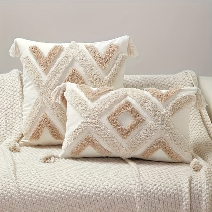 Boho beige tufted pillow cover with tassels and geometric diamond pattern, ideal for couch or bed. Made of polyester with zip closure, hand wash only. Insert not included.