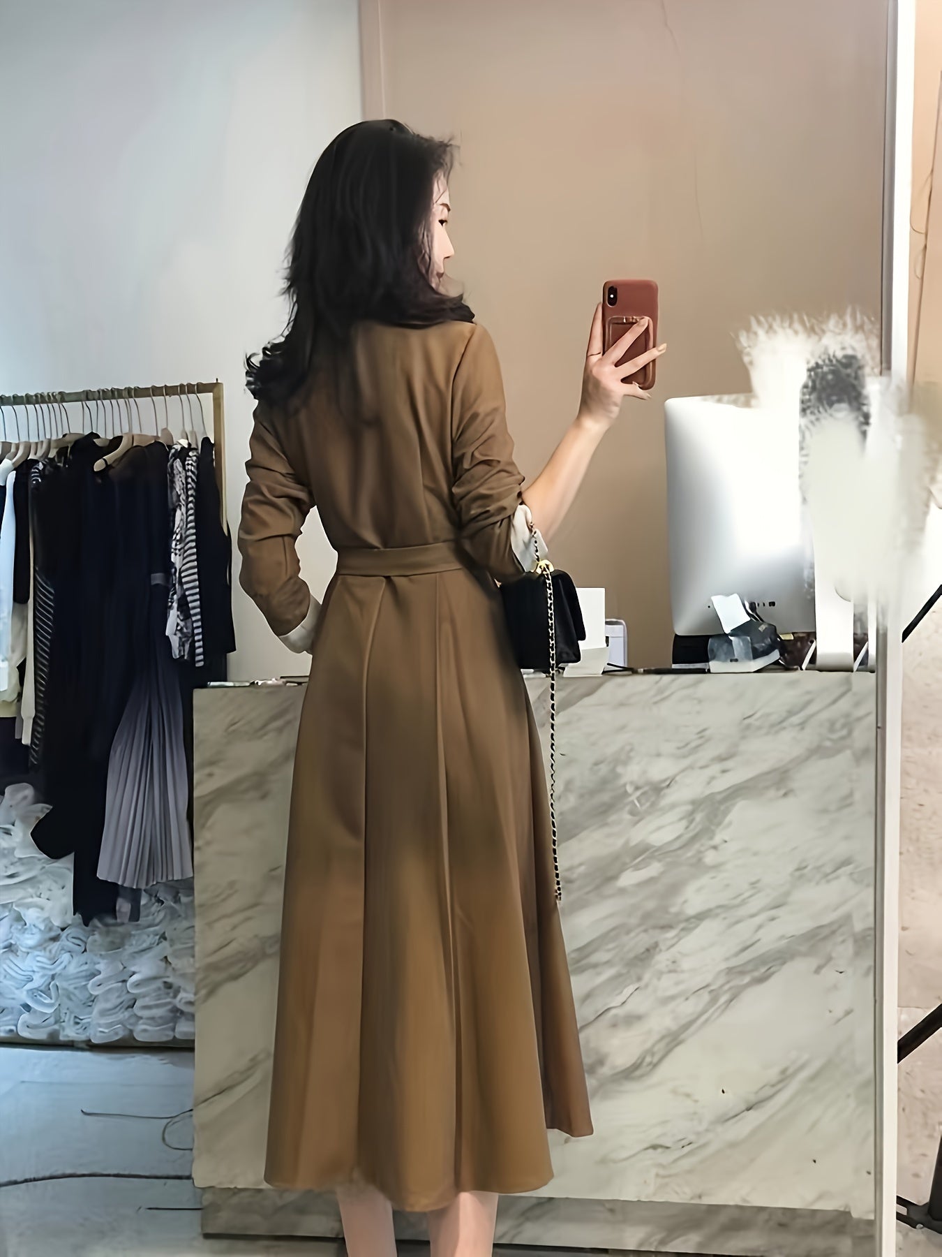 Stylish midi dress in solid brown polyester with V-neck, A-line cut, belt, and long sleeves. Suitable for spring, summer, or fall, and is machine washable.