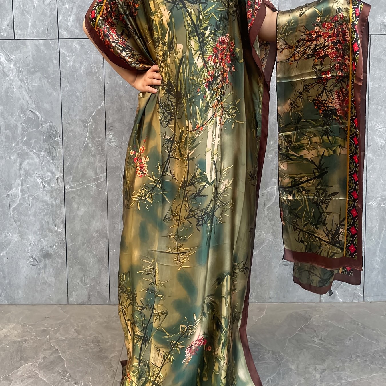 Stylish plus size maxi kaftan dress with crew neck and short sleeves made of comfortable polyester fabric. Loose fit with all-over print design, perfect for summer beach and outdoor events.