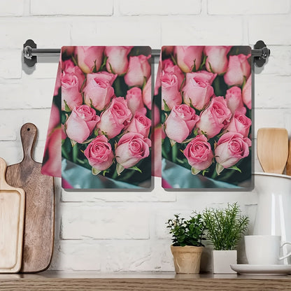 This set includes two ultra-soft kitchen towels with a charming Valentine's Day pink roses design. The towels are highly absorbent and perfect for drying dishes. They also make a great holiday decoration. The towels are machine washable and measure