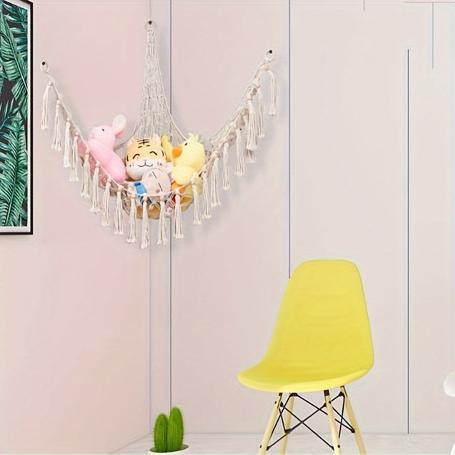 Handmade macrame wall storage net with hooks for toys and plushies. Versatile decor for living room, bedroom, or playroom.