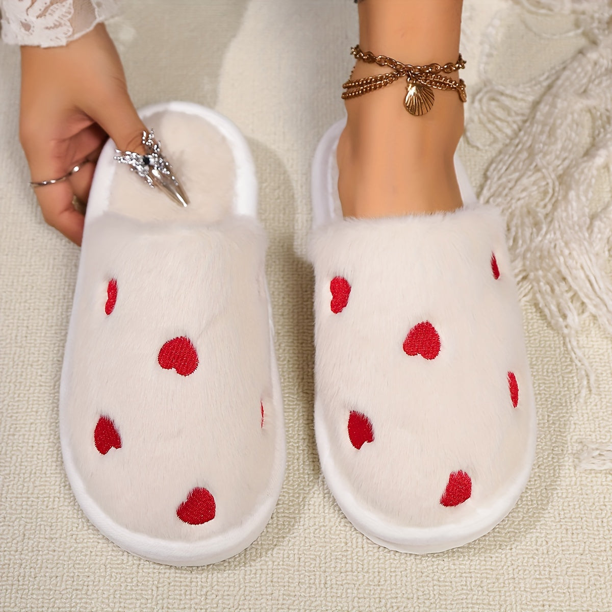 Soft and warm women's winter slippers with heart pattern - cozy and cute design, non-slip sole, hand washable, available in black, white, pink.