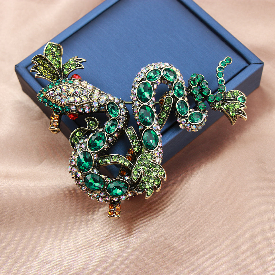 Sophisticated Vintage Python Brooch adorned with Shimmering Rhinestones - Uncommon Animal-Inspired Fashion Accent for Women