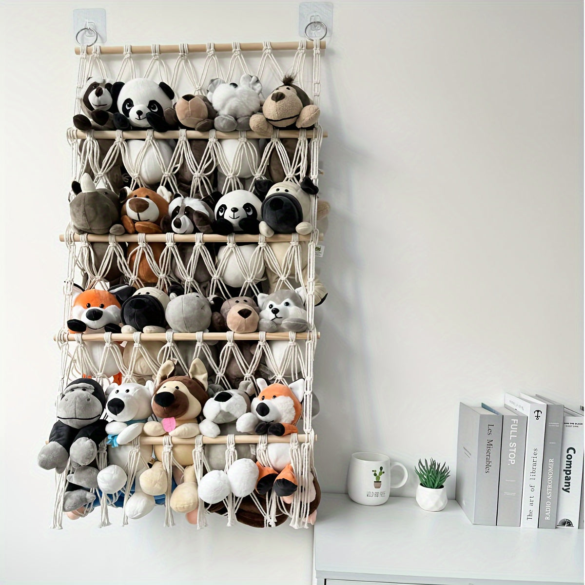 Plush animal storage solutions: net, rack, and hammock for hanging and organizing plush animals.