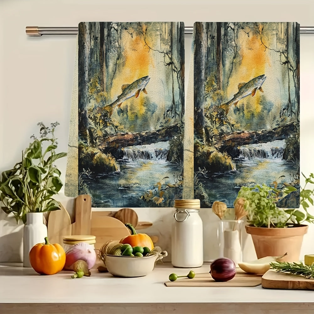 Two pieces of ultra soft kitchen towels featuring a serene forest stream and salmon jump design. These highly absorbent towels are machine washable and perfect for drying dishes or hands. With a contemporary style, each towel measures 40.64x60.96 cm.