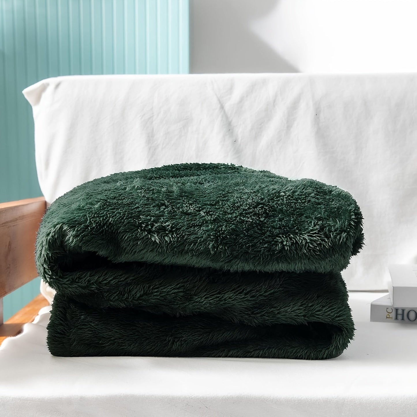 Soft, warm, and lightweight, this plush fleece baby size extra large throw blanket in forest green is perfect for couches, beds, and sofas. Ideal for snuggling up on chilly nights.