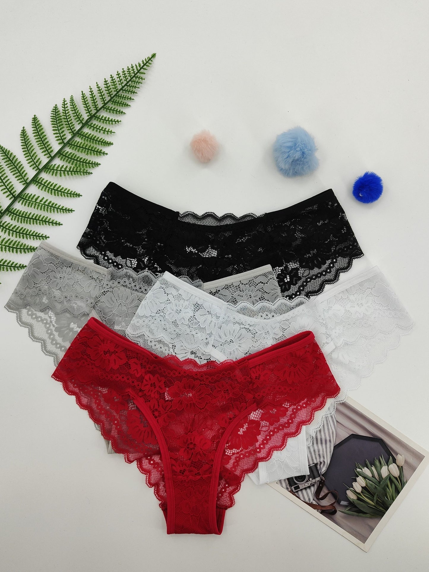 Four pieces of sheer jacquard lace bikini panties for women, featuring mid-stretch low waist design  lingerie and underwear.