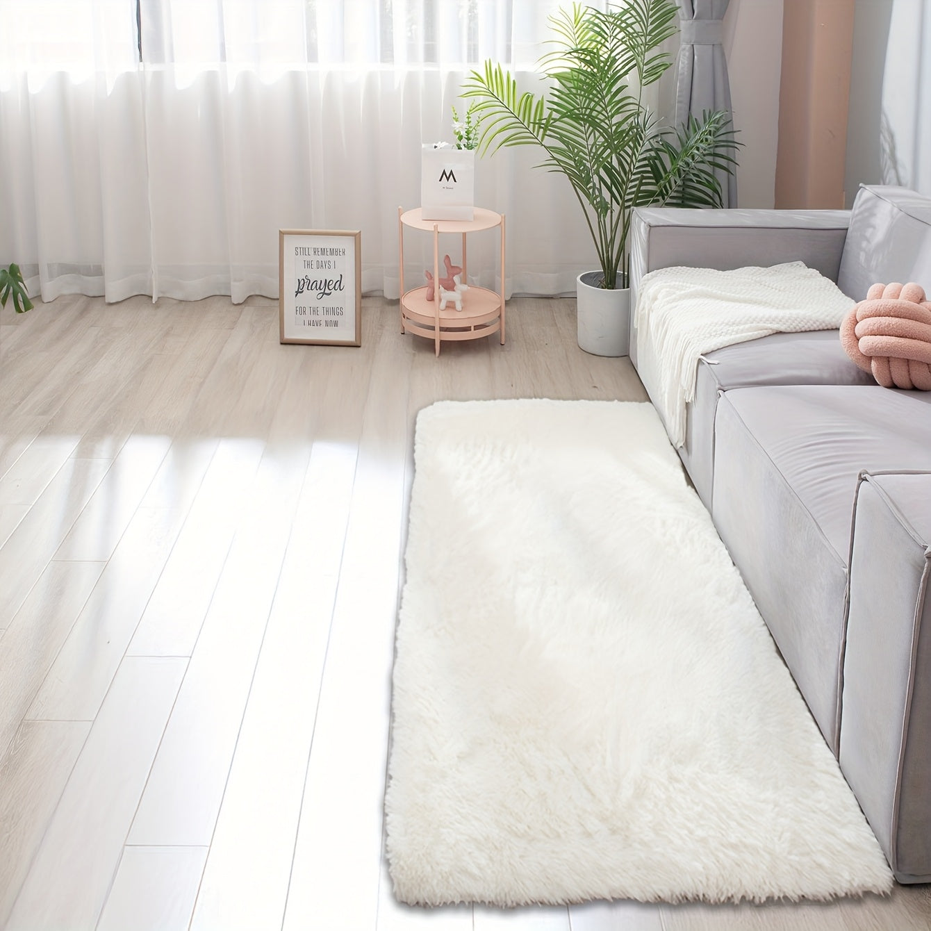 Soft and fluffy rectangle area rug perfect for your bedroom. This plush carpet is thick and non-slip, making it ideal for your living room. Made with machine-made polyester fiber, this low-pile rug is washable for easy cleaning. Perfect for indoor use.