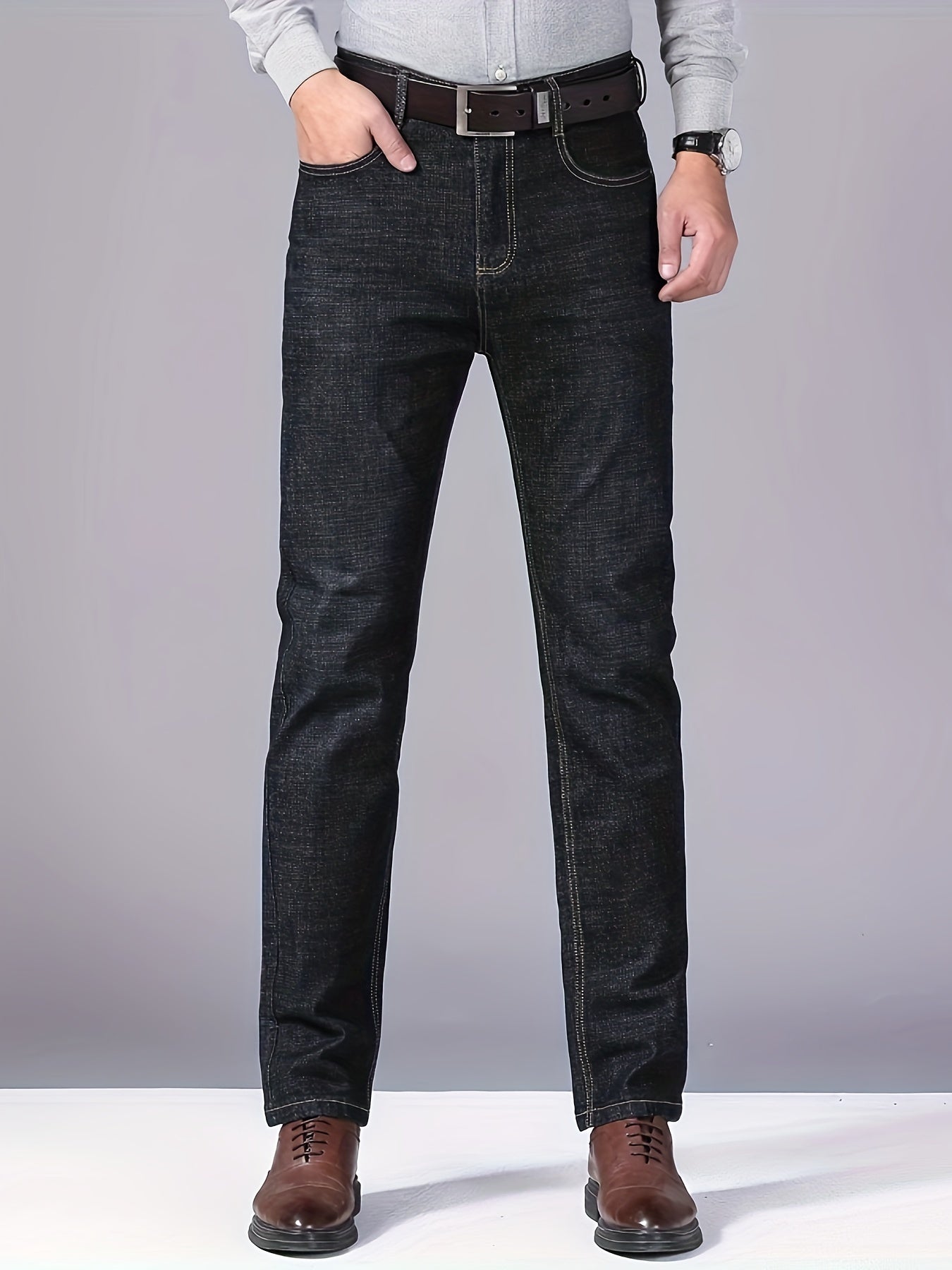 Men's denim pants with pockets, perfect for outdoor activities.