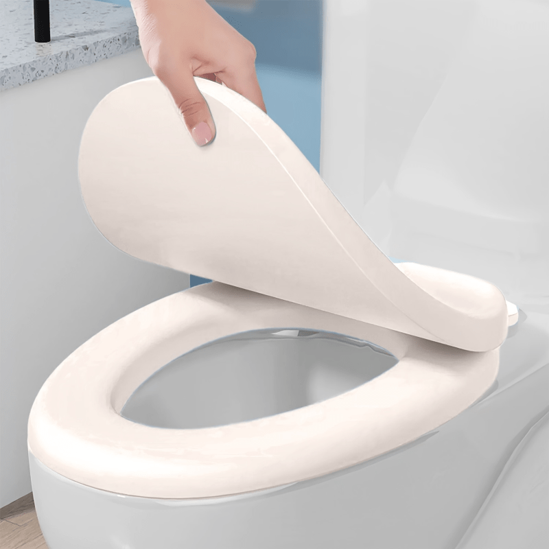 Soft and durable toilet seat cover with quick release, secure fit, anti-slip, and easy to clean, suitable for standard toilets in both home and commercial settings.