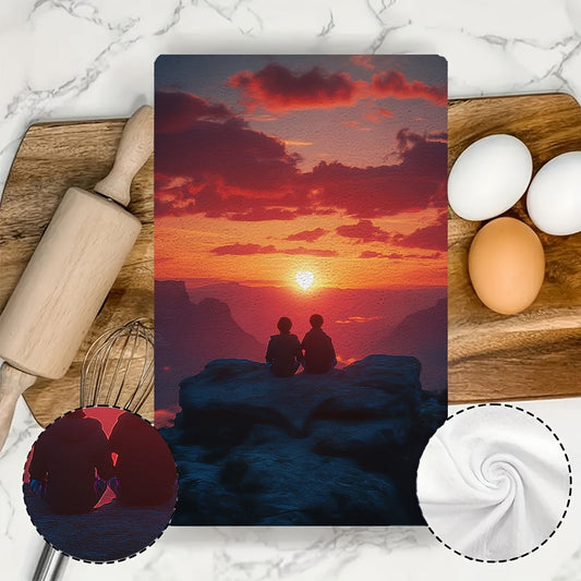 This duo of ultra-soft kitchen towels showcases two charming characters relaxing on a heart-shaped rock as they watch a beautiful sunset. These highly absorbent dish towels are ideal for adding a festive touch to your home decor, and are conveniently