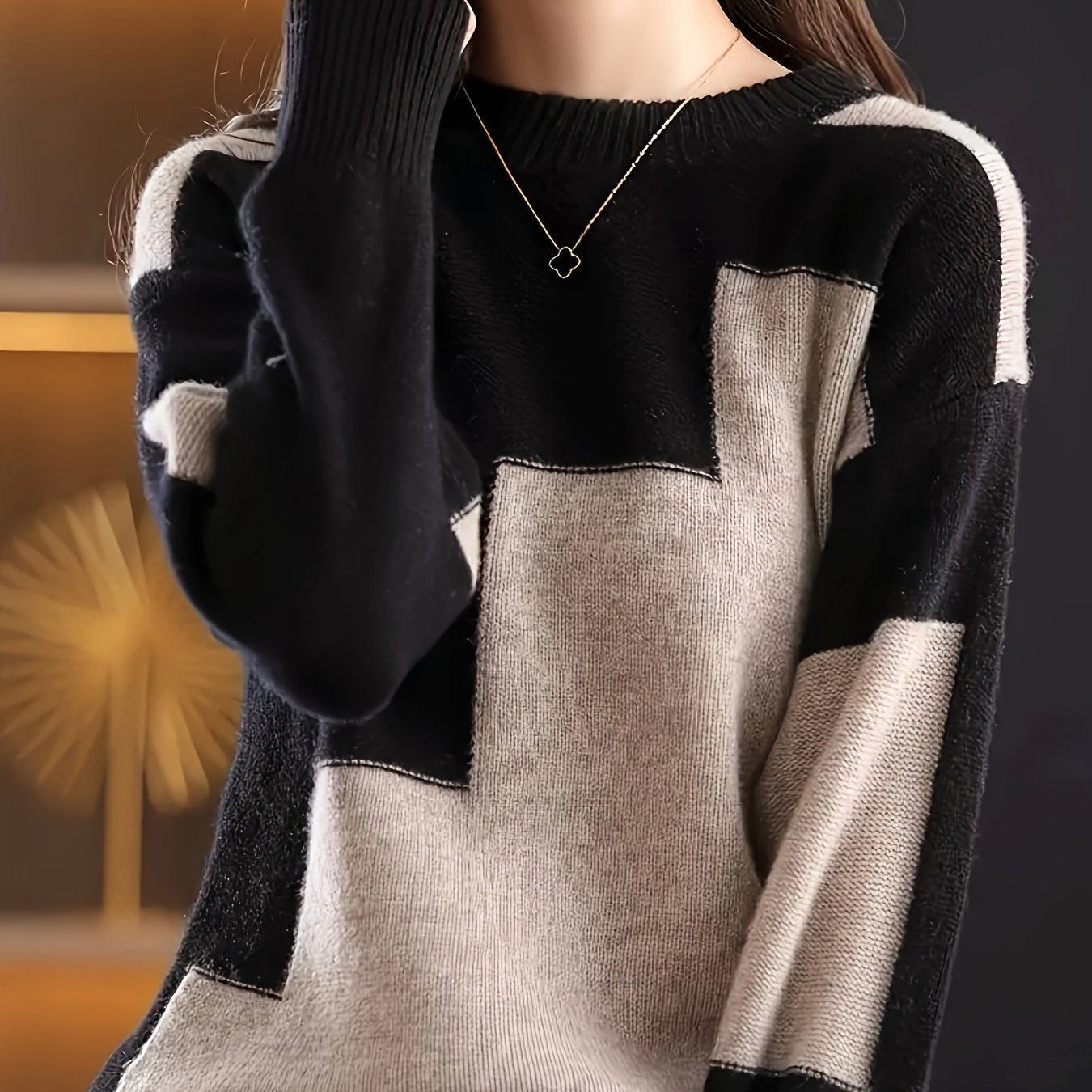 Women's color-blocked round-neck sweater, perfect for autumn and winter.