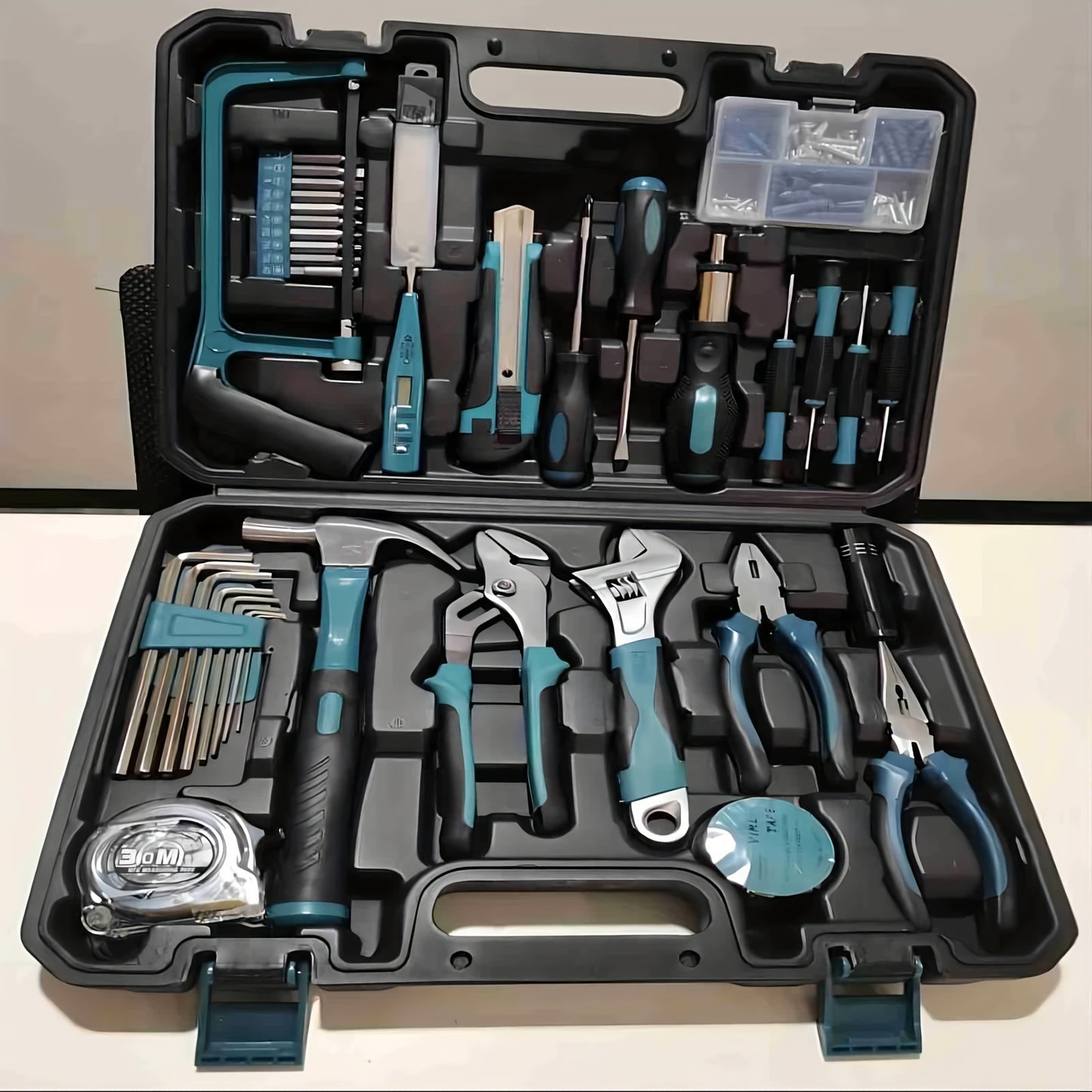 148 piece home tool kit with portable case, ratcheting screwdriver, hex key, pliers, wrench, tester - perfect gift for DIY enthusiasts.