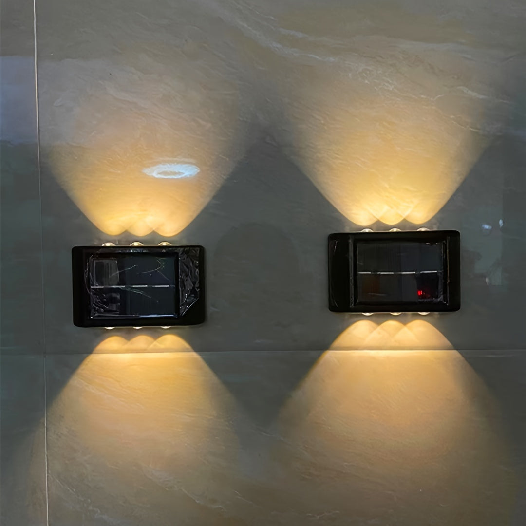 6 LED warm light Solar Wall Sconce for outdoor decorative lighting with energy-saving solar power, light sensor control, acrylic shade, and metal-like plastic housing.