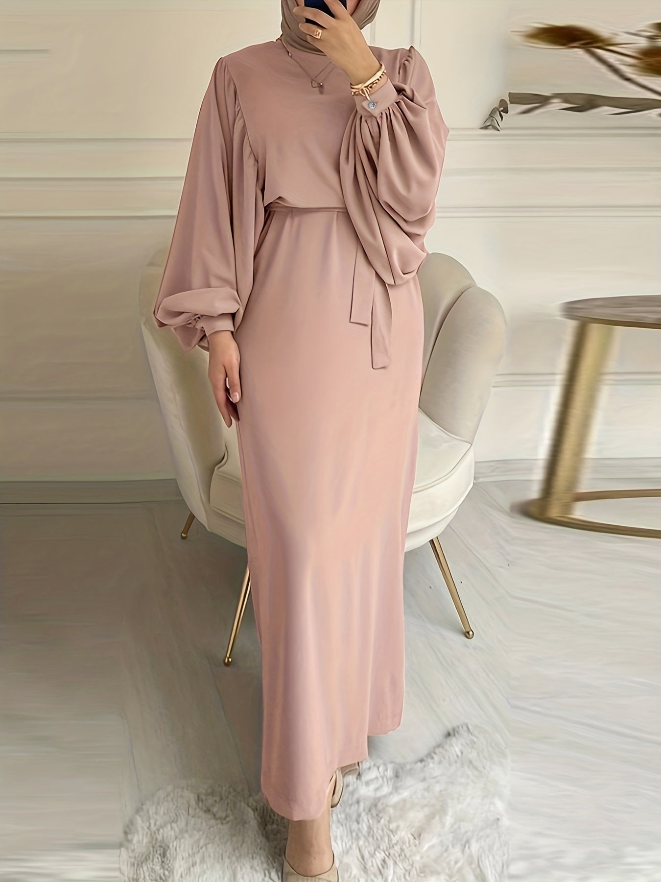 Elegant maxi abaya dress with solid tie waist and lantern sleeves.