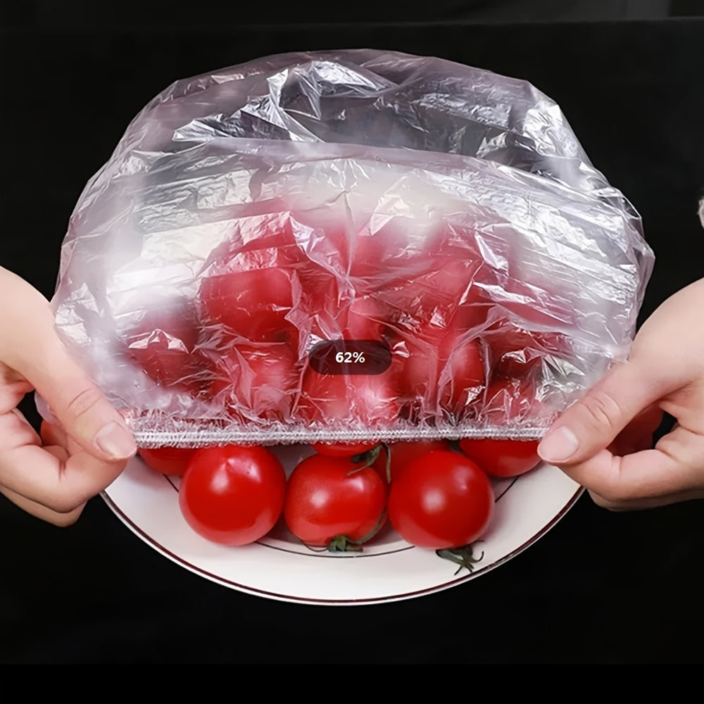 50-100 pieces of disposable fresh-keeping covers made of plastic for use in storing food. These covers are elastic and can be used to cover various storage containers in the kitchen or outdoors during picnics and camping trips.