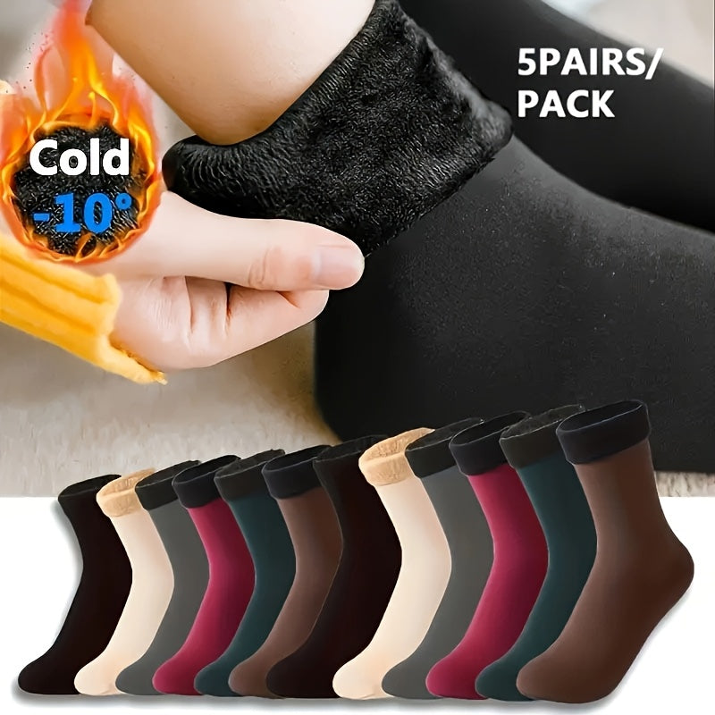 5 pairs of cozy mid-calf boot socks made of soft, breathable, elastic polyester for cold weather comfort.