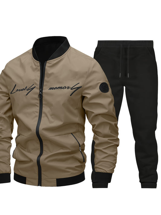 Men's Classic Bomber Jacket & Jogging Pants Set in sleek black with letter embroidery. Made of durable polyester with elastic cuffs and waistband. Ideal for outdoor activities and casual