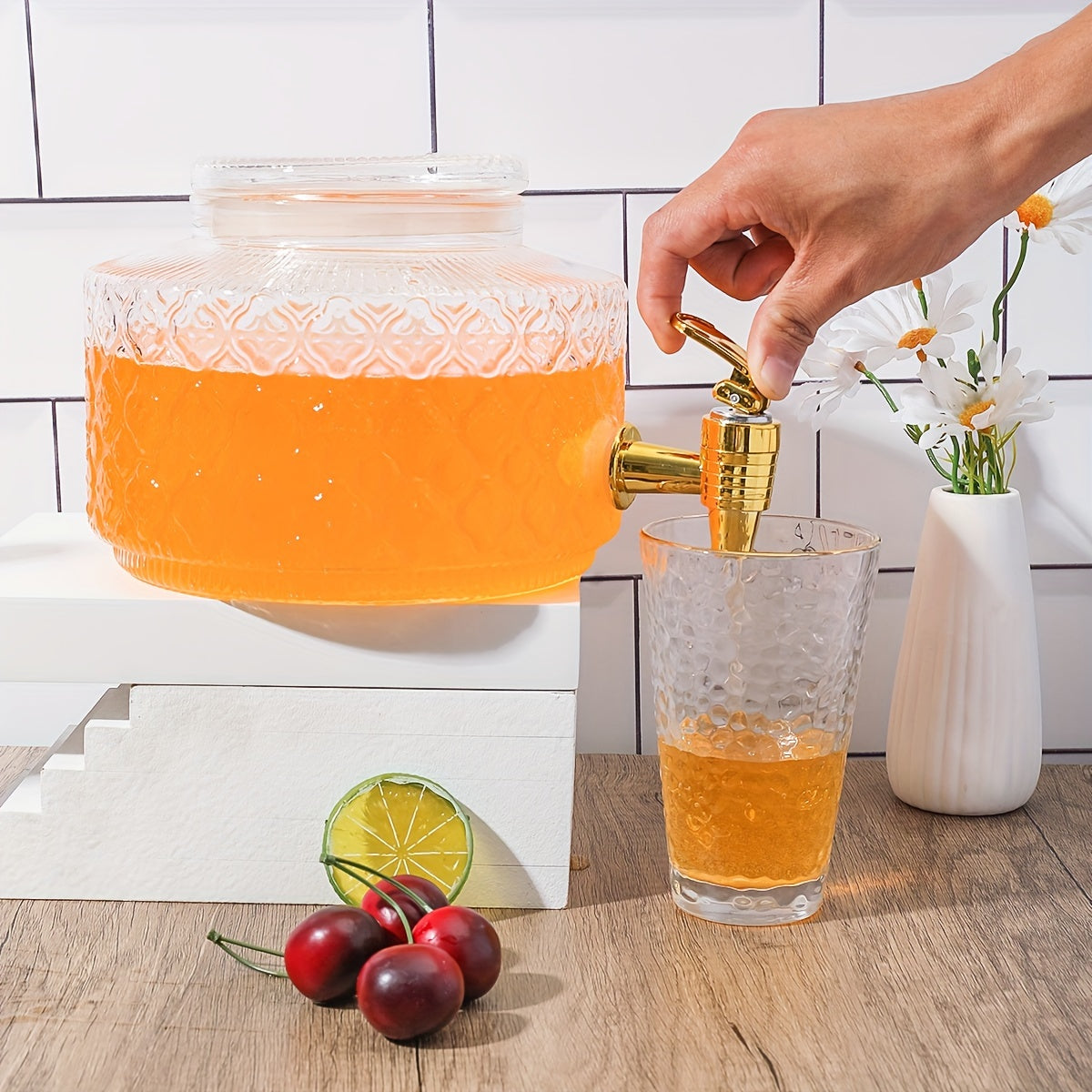 Large capacity glass beverage dispenser with spigot for serving cold drinks. This transparent thickened drink container is perfect for fruit juice, iced tea, and cocktails. Take it anywhere as a portable refrigerator drink dispenser.