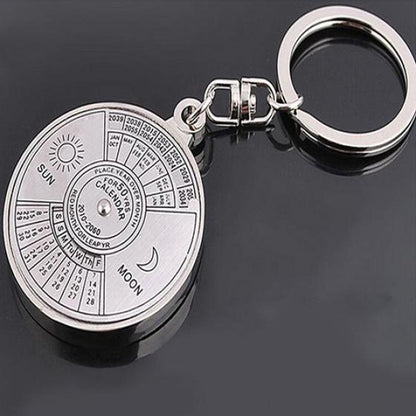 Perpetual calendar keychain with rotating compass. Unique gift for car keys.