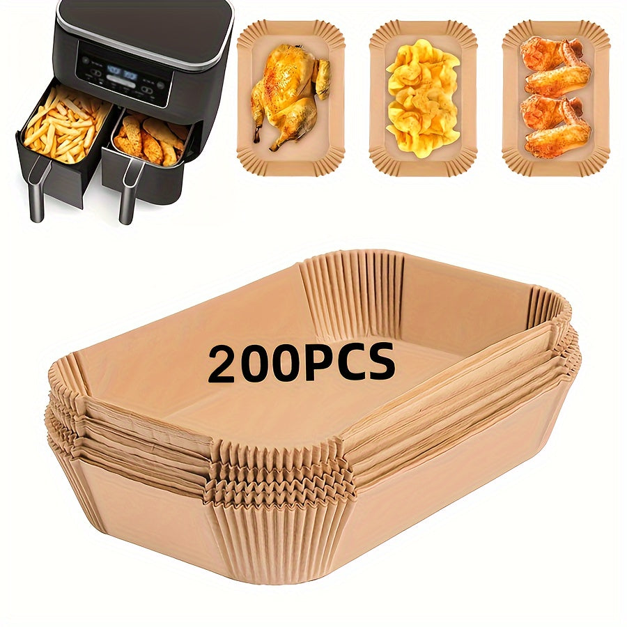 50 or 100 pieces of Disposable Air Fryer Liners, with measurements of 26.01cm X 16.99cm, suitable for bottom lining in air fryer pots, baskets, baking trays, and ovens. These rectangular paper liners are versatile kitchen accessories and baking tools.