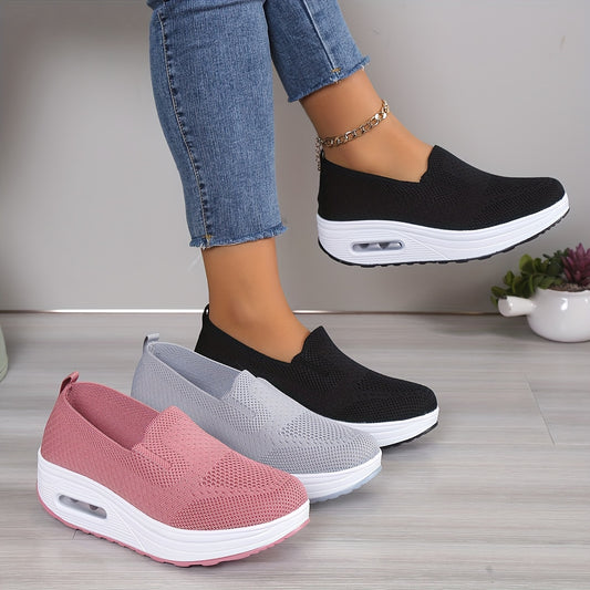 Women's slip-on sneakers from the Spring Collection in solid colors of black, light gray, pink, and dark blue. Features breathable knit fabric, air cushion sole, and low-top design for