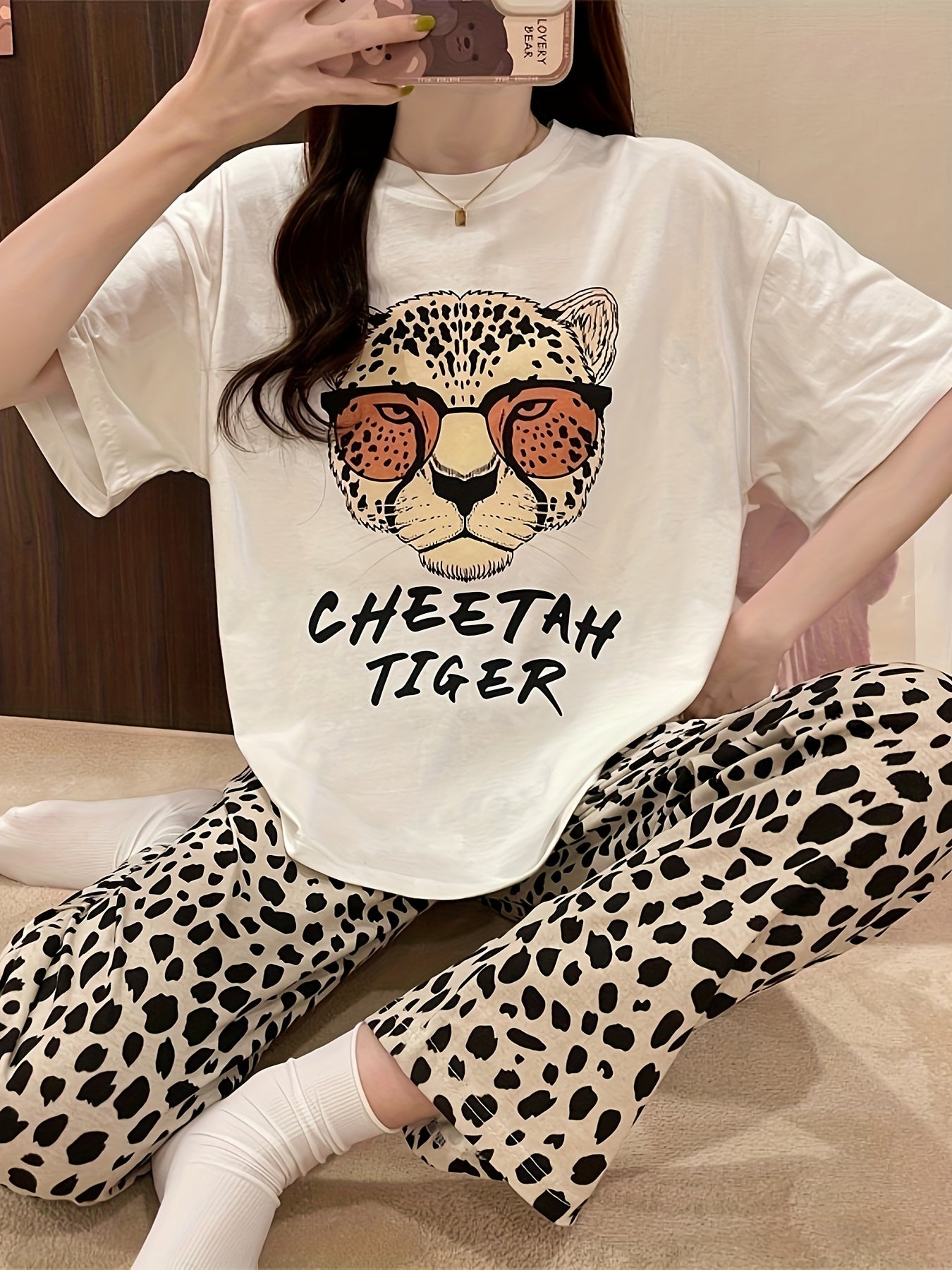 Casual pajama set for women with leopard and letter print, featuring a short sleeve top and matching pants for a comfortable fit.