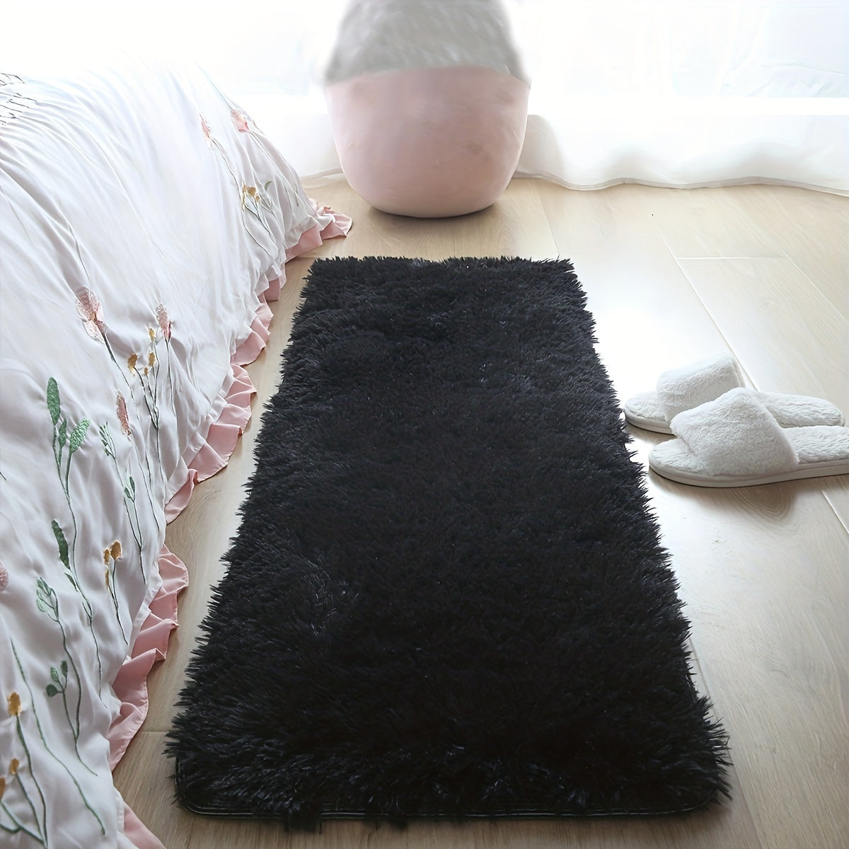 One piece of a shaggy rug, a fluffy floor mat, a simple plush area rug, a round soft area rug mat, a comfortable household carpet, perfect for your living room.