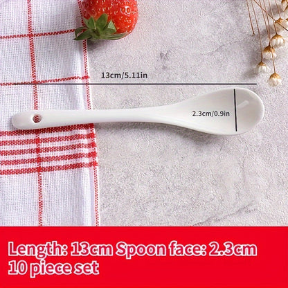 A set of 10 ceramic spoons with a long handle measuring 12.95cm, made of white porcelain for serving coffee, soup, seasoning, and espresso. Perfect for adding an elegant touch to your kitchen and dining essentials.