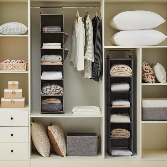 Multi-layer hanging closet organizer with drawers, fabric storage bag and hanging shelves for clothes. Space-saving wardrobe storage system with hooks.