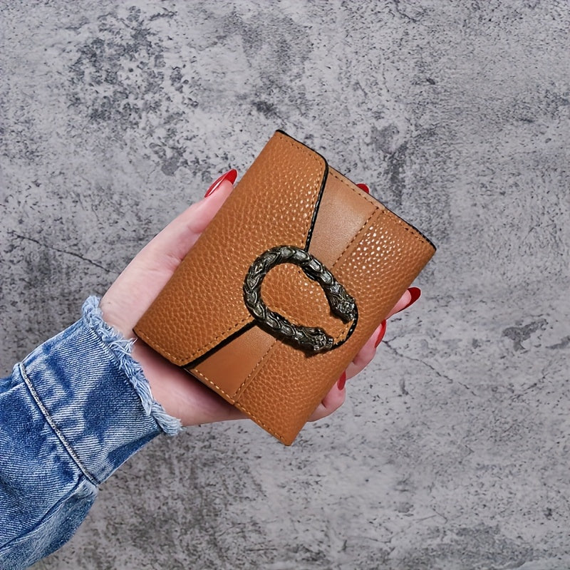 Vintage style women's slim wallet made of faux leather with buckle closure, tri-fold design, slip pocket, and faux leather lining.