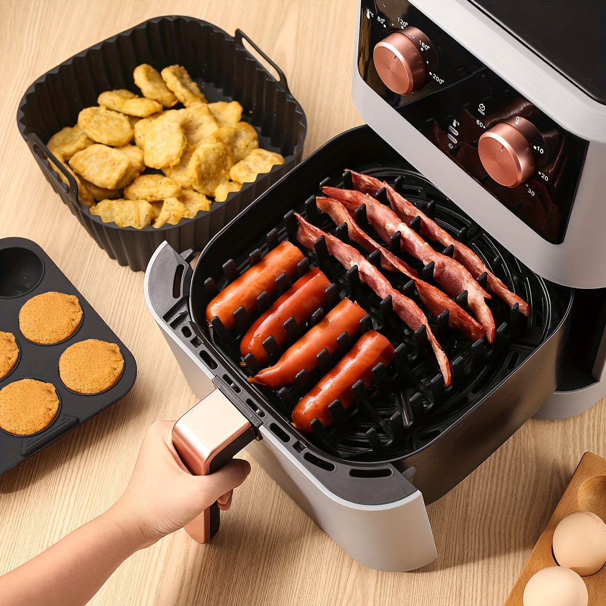 1 set of square silicone air fryer accessories, including a 19.0 cm bacon & hot dog rack, a 9 cavity cake mold, and an air fryer liner. These accessories are BPA-free, dishwasher safe, and compatible with 7QT+ air fryers in black color.