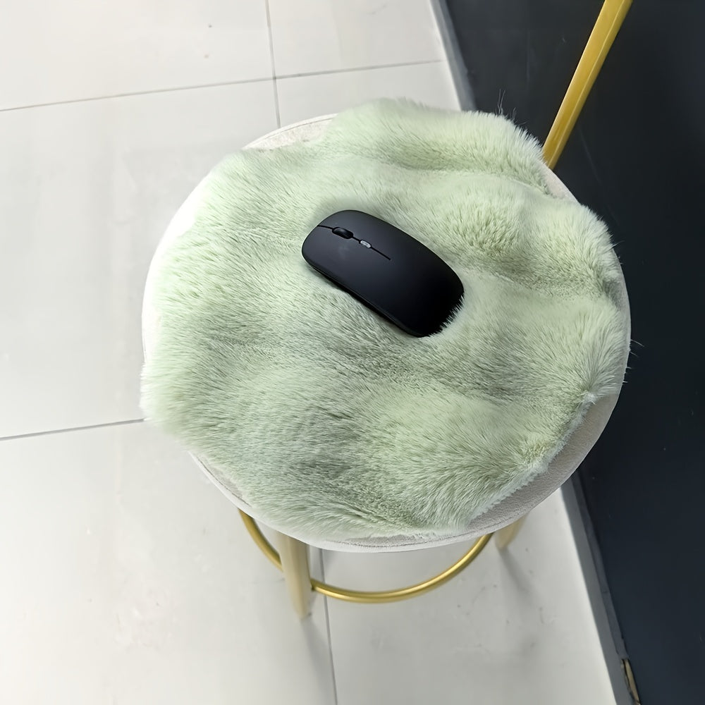 Round plush fabric carpet that is simple, solid, fluffy, soft, and comfortable. This cute indoor decor is easy to clean, furry, warm, and suitable for chair pads, room, bedroom, and indoor use. Made of polyester, it is only suitable for dry cleaning and