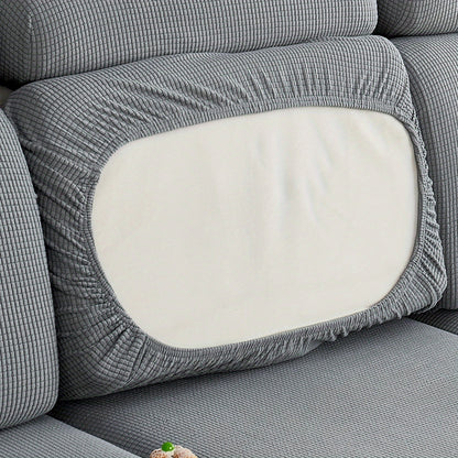 Durable sofa cover protects furniture from spills and stains.