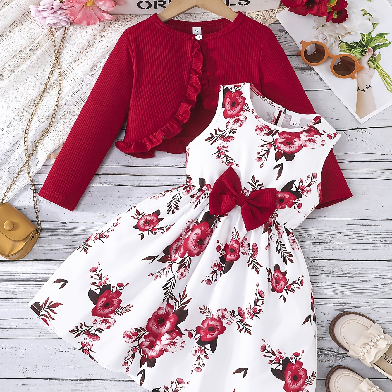 Girl's 2-piece outfit: Sundress with bow and floral pattern + Ruffle cardigan top. Casual wear for spring/fall, perfect for outdoor activities.