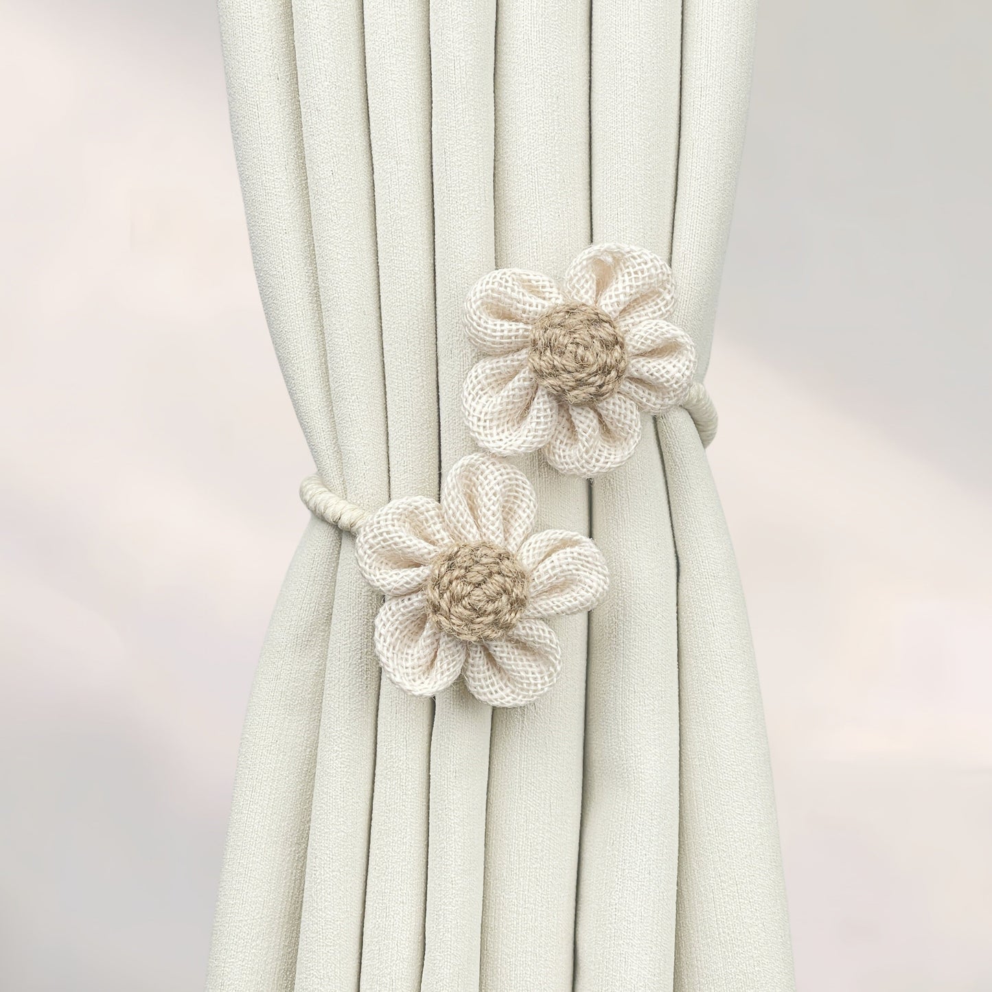 Multipack of handcrafted flower knot curtain tiebacks made from boho style cotton and linen - perfect decorative holdback clips for living room, bedroom, and home decor.