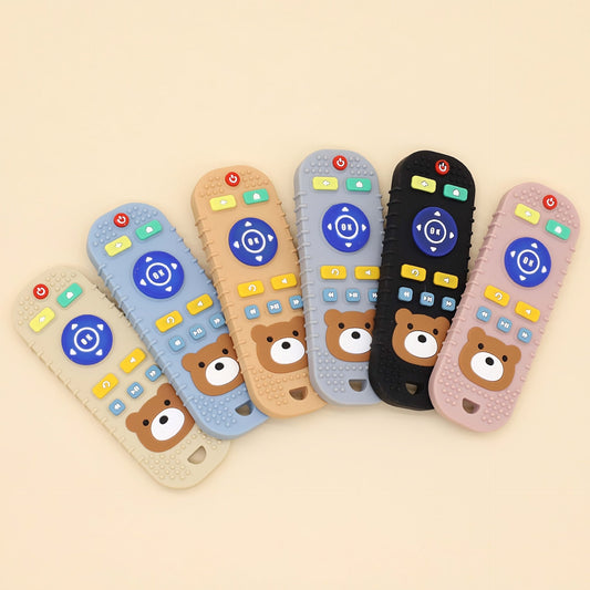 Available in beige, pink, blue, and black, the Cartoon Teddy Bear Silicone Dental Gel Remote Control is a soothing hand guard designed to prevent teeth grinding and biting.