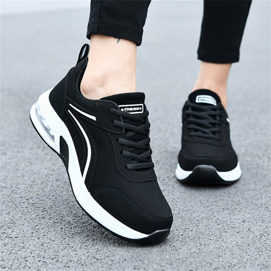 Women's casual sneakers made from black synthetic leather, featuring a lightweight design, air cushion support, lace-up style suitable for work, travel, or sports. Stylish and breathable