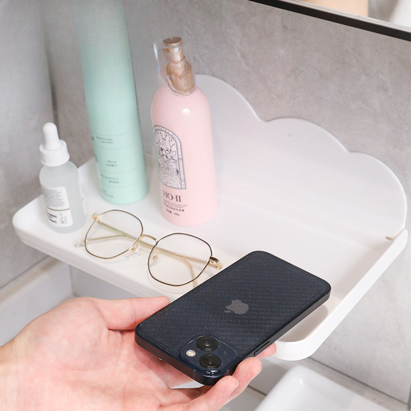 Foldable Storage Rack for mobile phones; wall-mounted, space-saving, stable, and durable. Perfect for organizing toothpaste, toothbrushes, facial cleansers, cosmetics, and more.