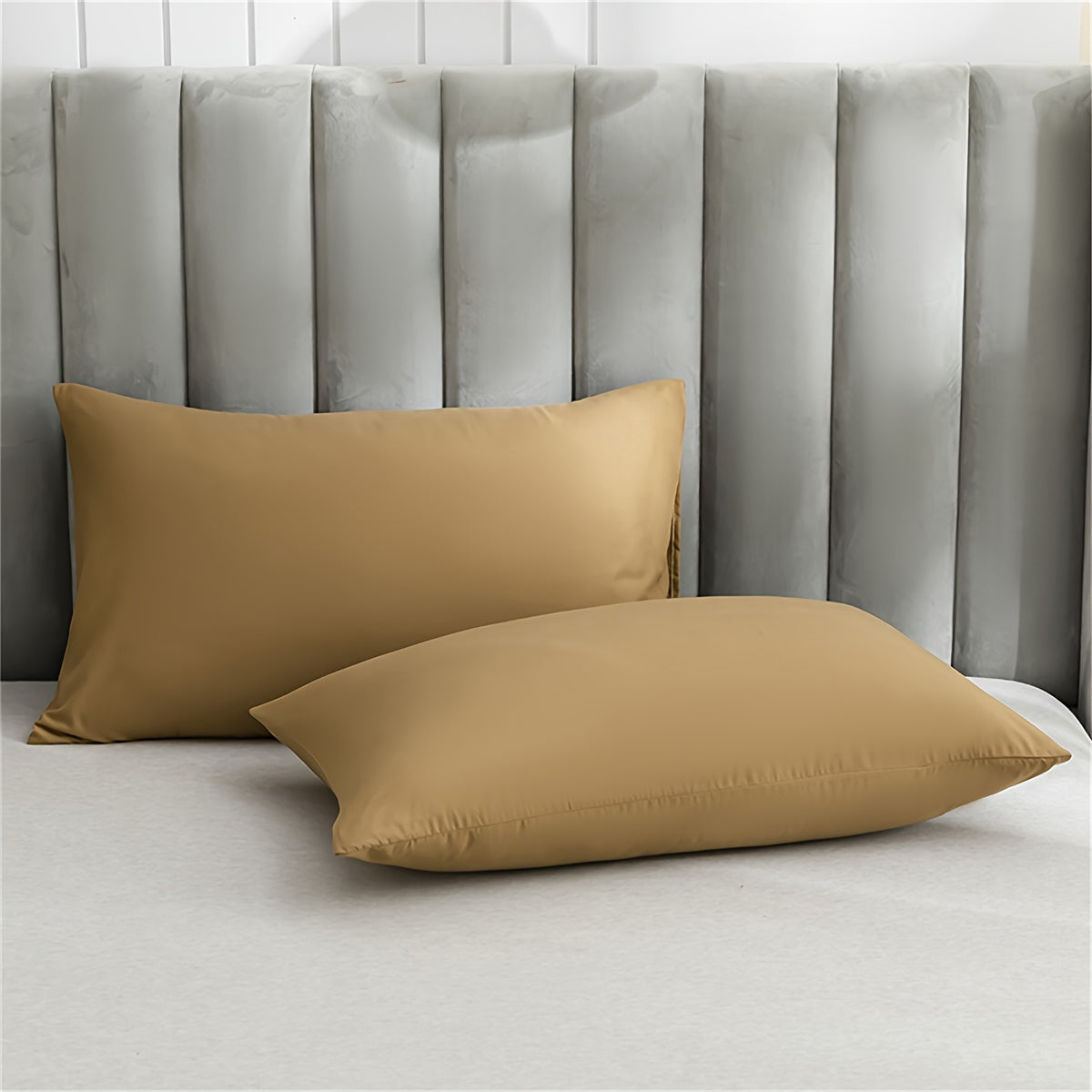 Soft and plush pillowcase with a solid color design, featuring a thick and cozy feel. Includes an envelope closure and is machine washable, making it ideal for creating a comfortable bedroom atmosphere.