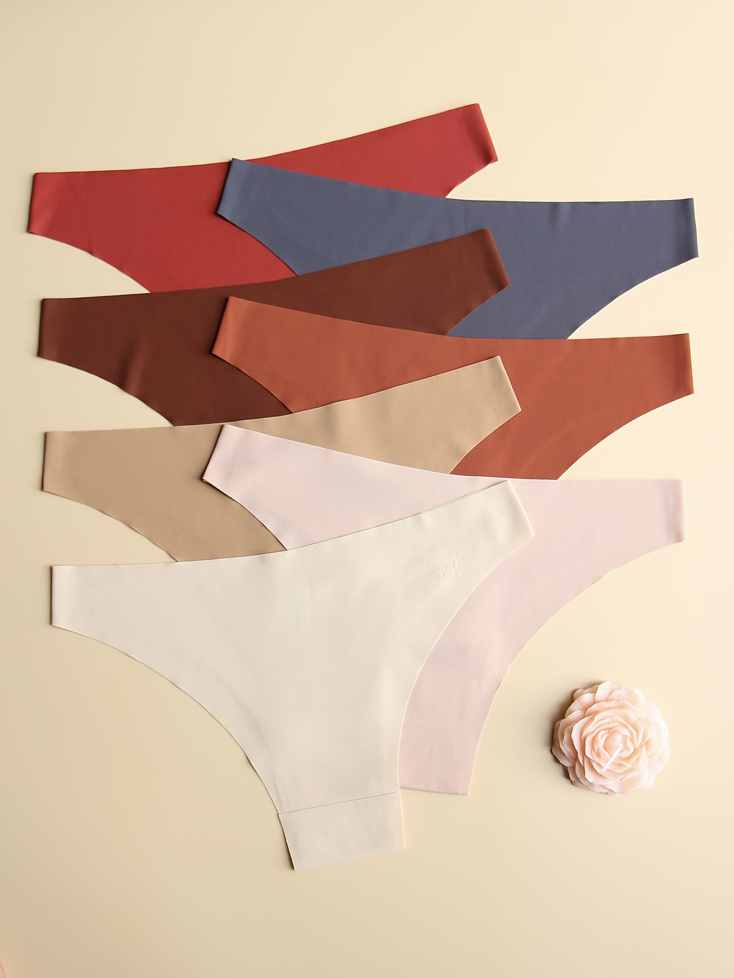 7-pack of seamless low-rise women's panties in solid colors. Stretchy, no-track, comfortable, breathable, and soft. Simple style.