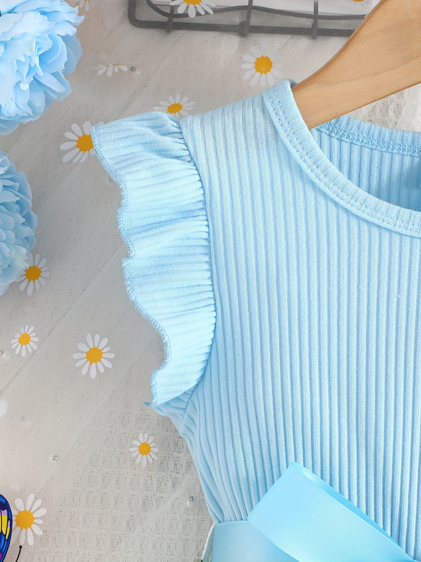 Girls' light blue ribbed cotton dress with butterfly & floral print, flutter sleeves & belt detail. Casual summer wear, machine washable. Dresses for girls.