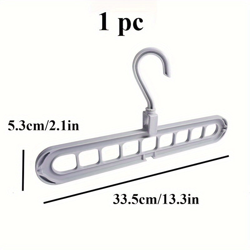 Space-saving multi-hole clothes hanger for home, dorm, and travel - foldable drying rack for trousers, shirts, and skirts, also doubles as a shower caddy.