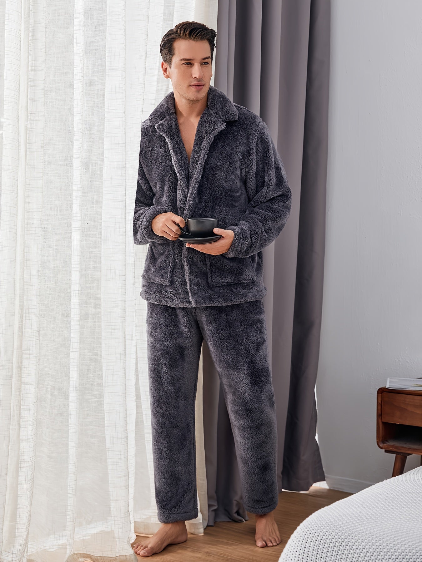 Warm and cozy men's fleece pajama set with pockets, perfect for winter. Features long sleeve top and pants. Machine washable.