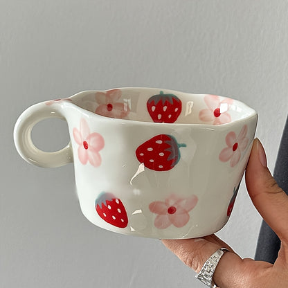 Unique hand-painted ceramic mug with a charming strawberry and floral design, perfect for coffee or tea. Ideal Valentine's Day gift, reusable and high-quality, featuring an irregular art style.