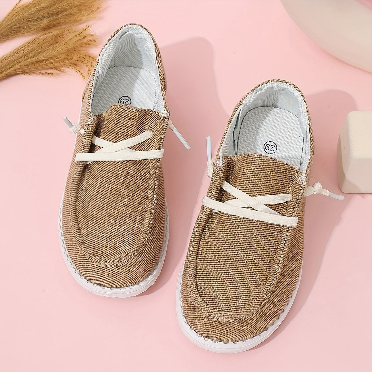 Boys' slip-on footwear, breathable and comfortable for all seasons in a classic style.