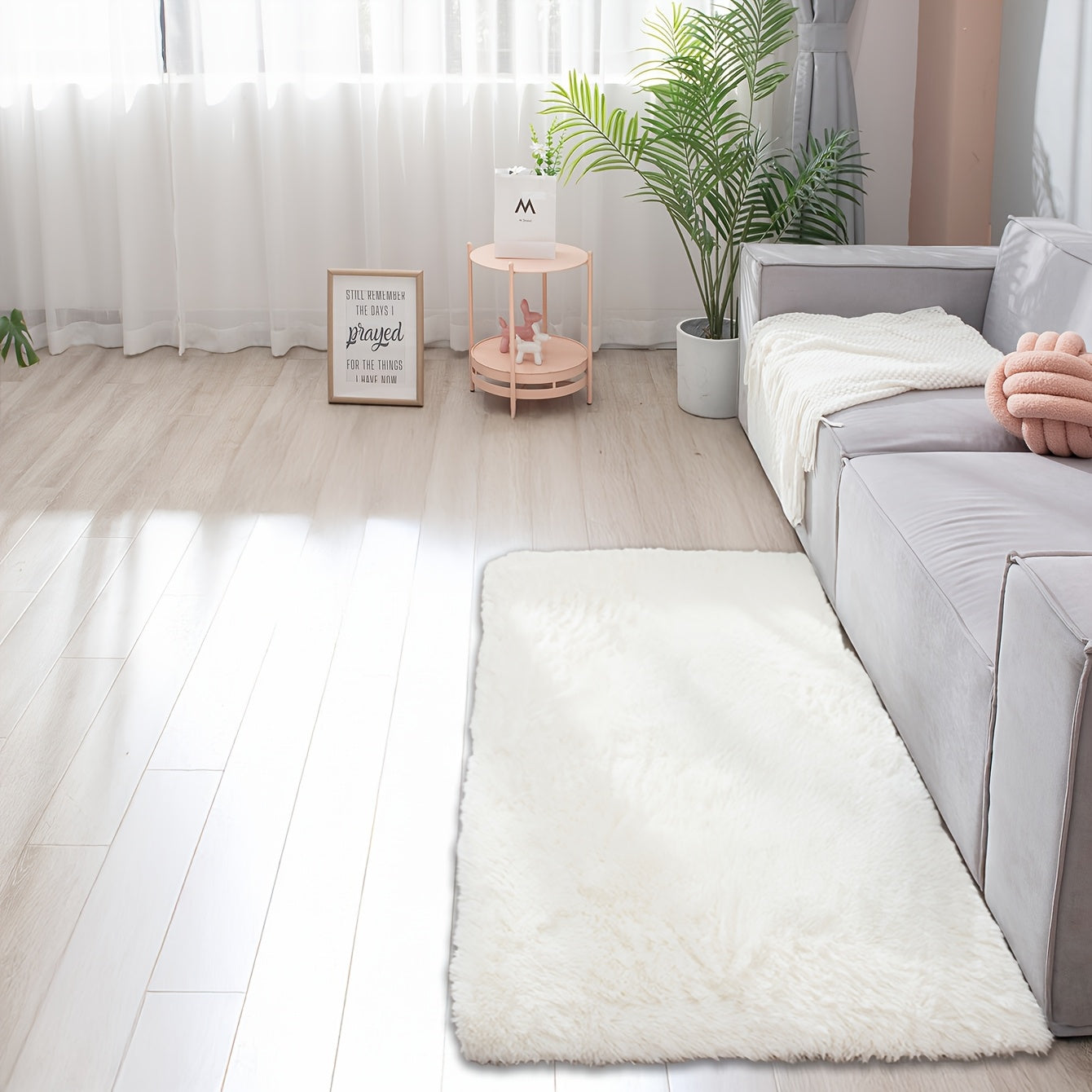 Soft and fluffy rectangle area rug perfect for your bedroom. This plush carpet is thick and non-slip, making it ideal for your living room. Made with machine-made polyester fiber, this low-pile rug is washable for easy cleaning. Perfect for indoor use.