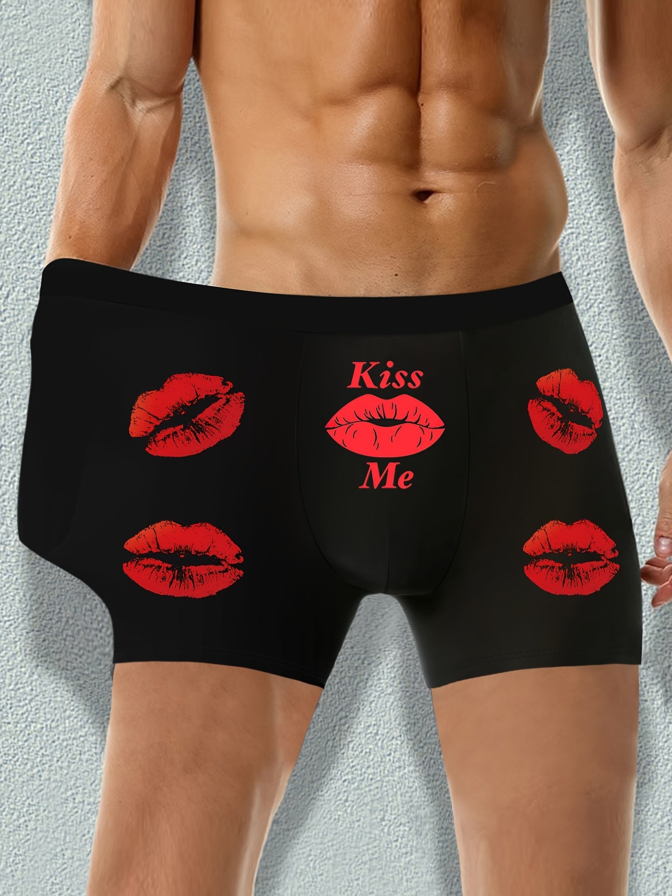 Men's black boxer shorts with red lips and print letter patterns for Valentine's Day, comfortable and stretchy.