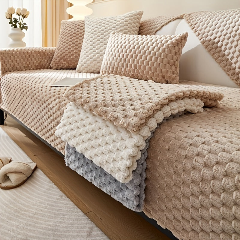 Non-slip sofa cover with honeycomb pattern, ideal for all seasons and protecting furniture in any room.