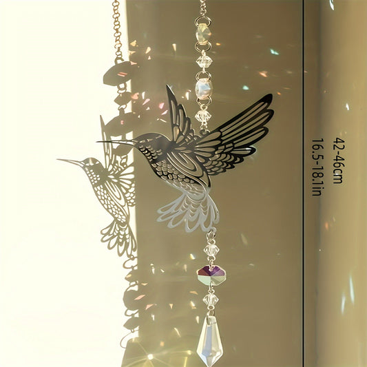 Metal plate sun catcher featuring a hummingbird design, ideal for hanging in windows, gardens, yards, rooms, or any other area in your home for decorative purposes.